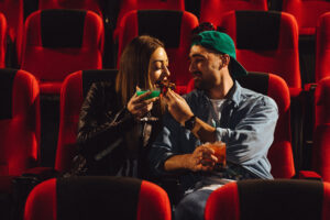 Couple in movie theatre