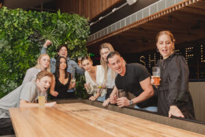 A group of people playing shuffle