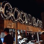 Bar with "Goon Bar" in blow up letters above it