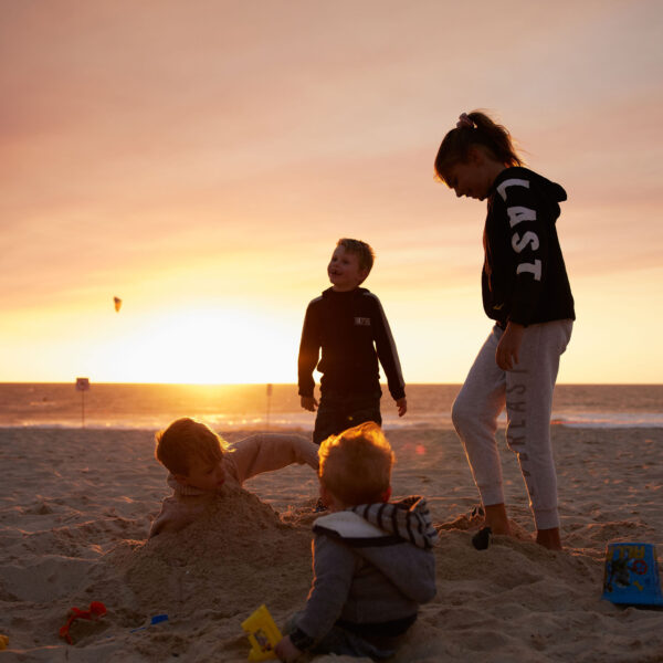 SSM kids sunset playing in sand